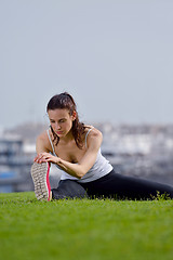 Image showing Young beautiful  woman jogging  on morning