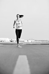 Image showing woman jogging at morning