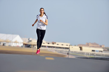 Image showing woman jogging at morning