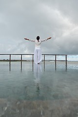 Image showing young woman relax on cloudy summer day