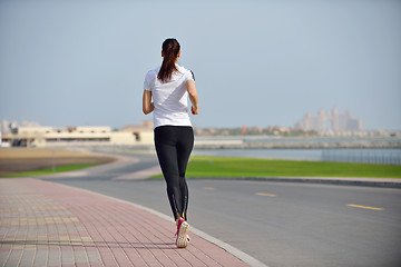 Image showing woman jogging at morning