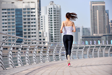 Image showing woman jogging at morning