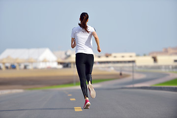 Image showing woman jogging at morning