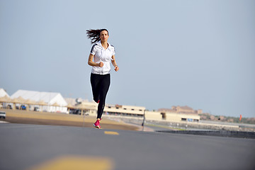 Image showing woman jogging at morning