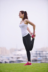 Image showing Young beautiful  woman jogging  on morning