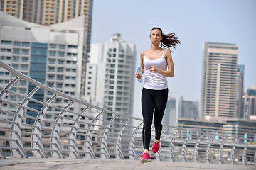 Image showing woman jogging at morning