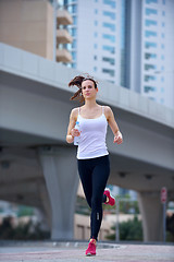 Image showing woman jogging at morning