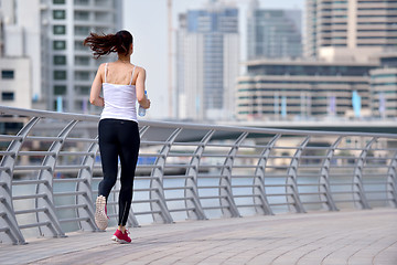 Image showing woman jogging at morning