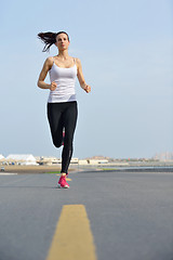 Image showing woman jogging at morning