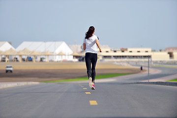 Image showing woman jogging at morning