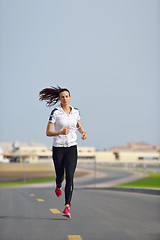 Image showing woman jogging at morning