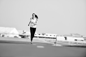 Image showing woman jogging at morning