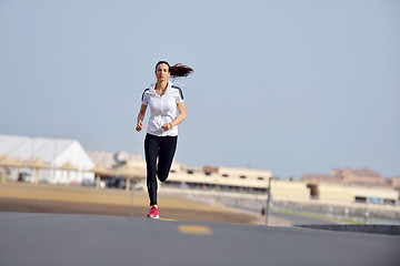 Image showing woman jogging at morning