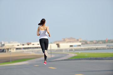 Image showing woman jogging at morning