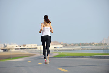 Image showing woman jogging at morning