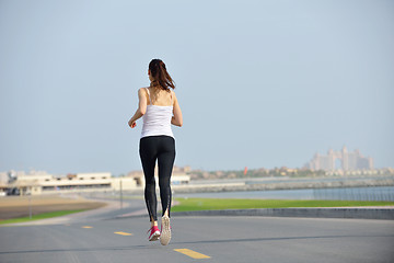 Image showing woman jogging at morning