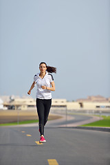 Image showing woman jogging at morning