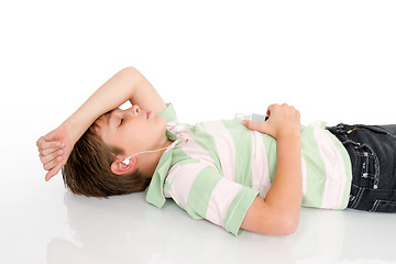 Image showing Boy listening music