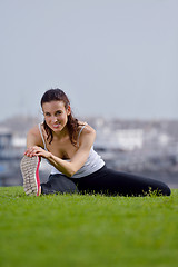 Image showing Young beautiful  woman jogging  on morning