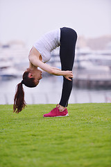 Image showing Young beautiful  woman jogging  on morning