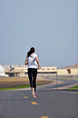 Image showing woman jogging at morning