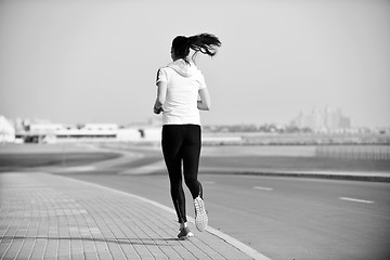 Image showing woman jogging at morning