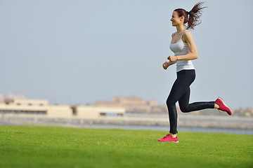 Image showing woman jogging at morning