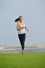 Image showing woman jogging at morning