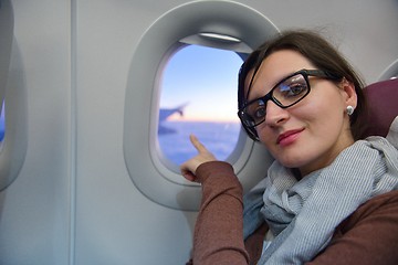 Image showing woman in airplane travel