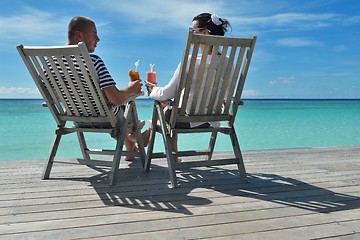 Image showing happy young couple relax and take fresh drink