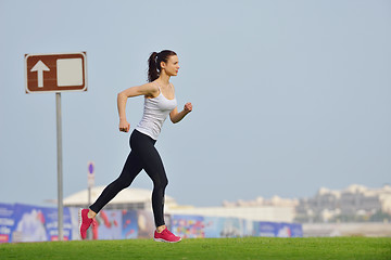 Image showing woman jogging at morning