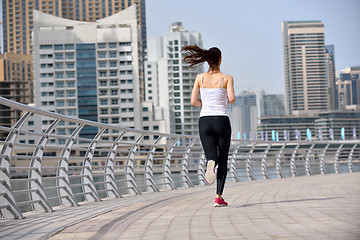 Image showing woman jogging at morning