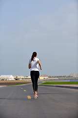 Image showing woman jogging at morning