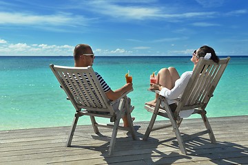 Image showing happy young couple relax and take fresh drink