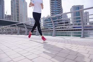 Image showing woman jogging at morning