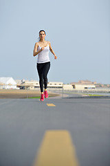 Image showing woman jogging at morning