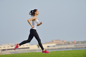 Image showing woman jogging at morning