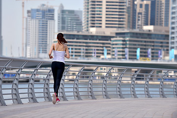 Image showing woman jogging at morning