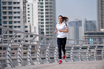 Image showing woman jogging at morning