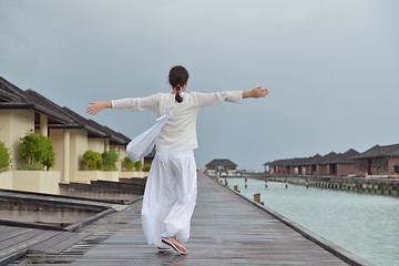 Image showing young woman relax on cloudy summer day