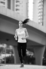 Image showing woman jogging at morning