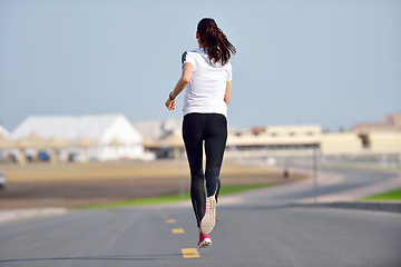 Image showing woman jogging at morning