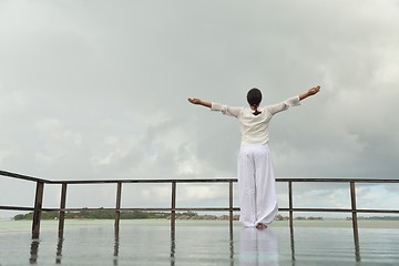 Image showing young woman relax on cloudy summer day