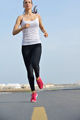 Image showing woman jogging at morning