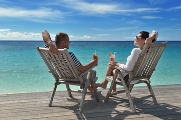 Image showing happy young couple relax and take fresh drink