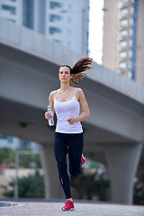 Image showing woman jogging at morning