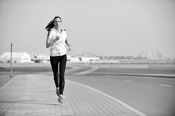 Image showing woman jogging at morning