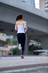 Image showing woman jogging at morning