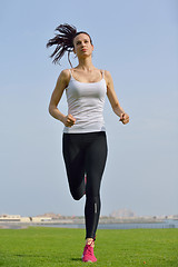 Image showing woman jogging at morning