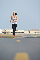 Image showing woman jogging at morning